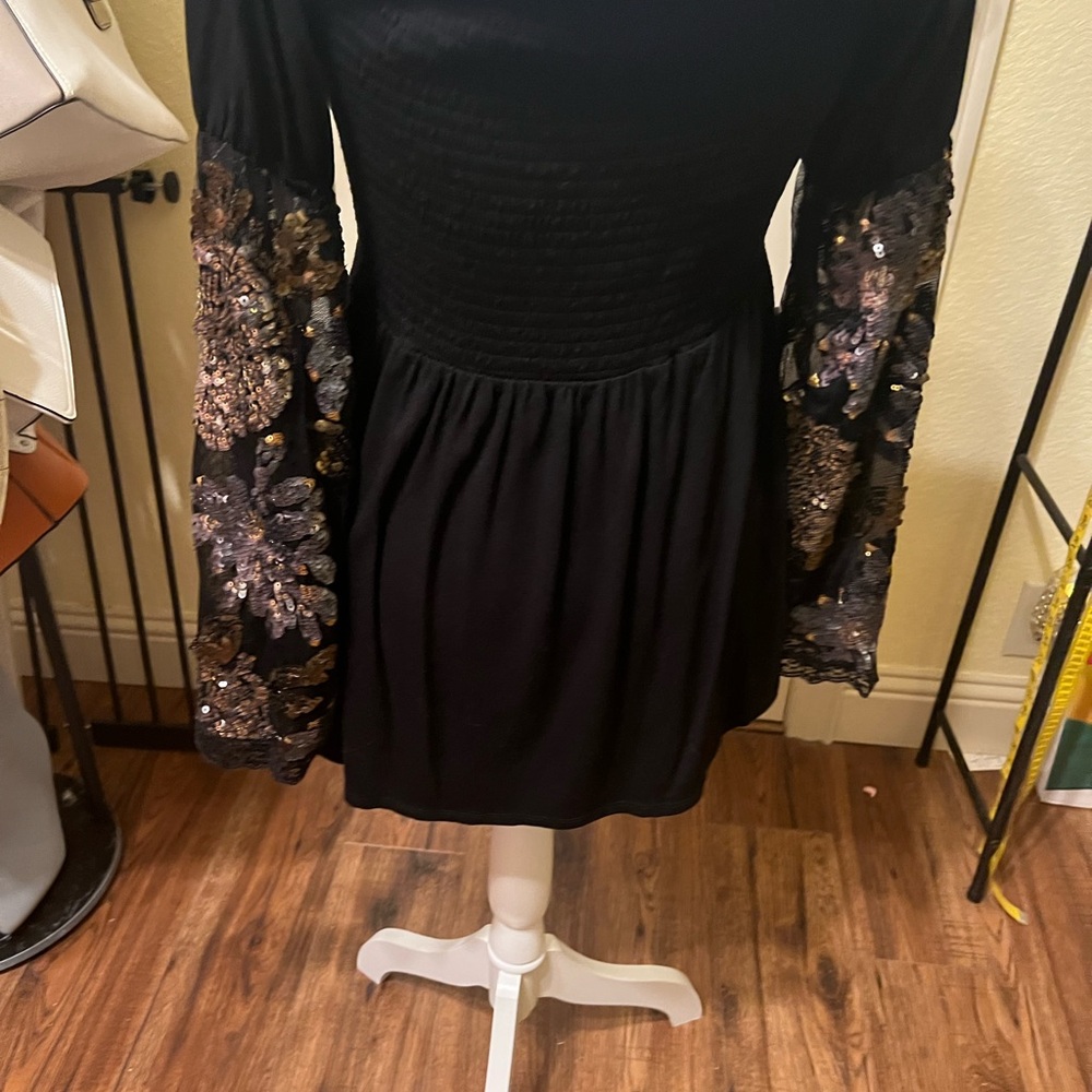 Elegant Black top with Gold Accents